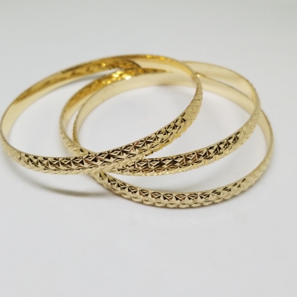 3 Gold Tone Diamond Cut Bangle Set
